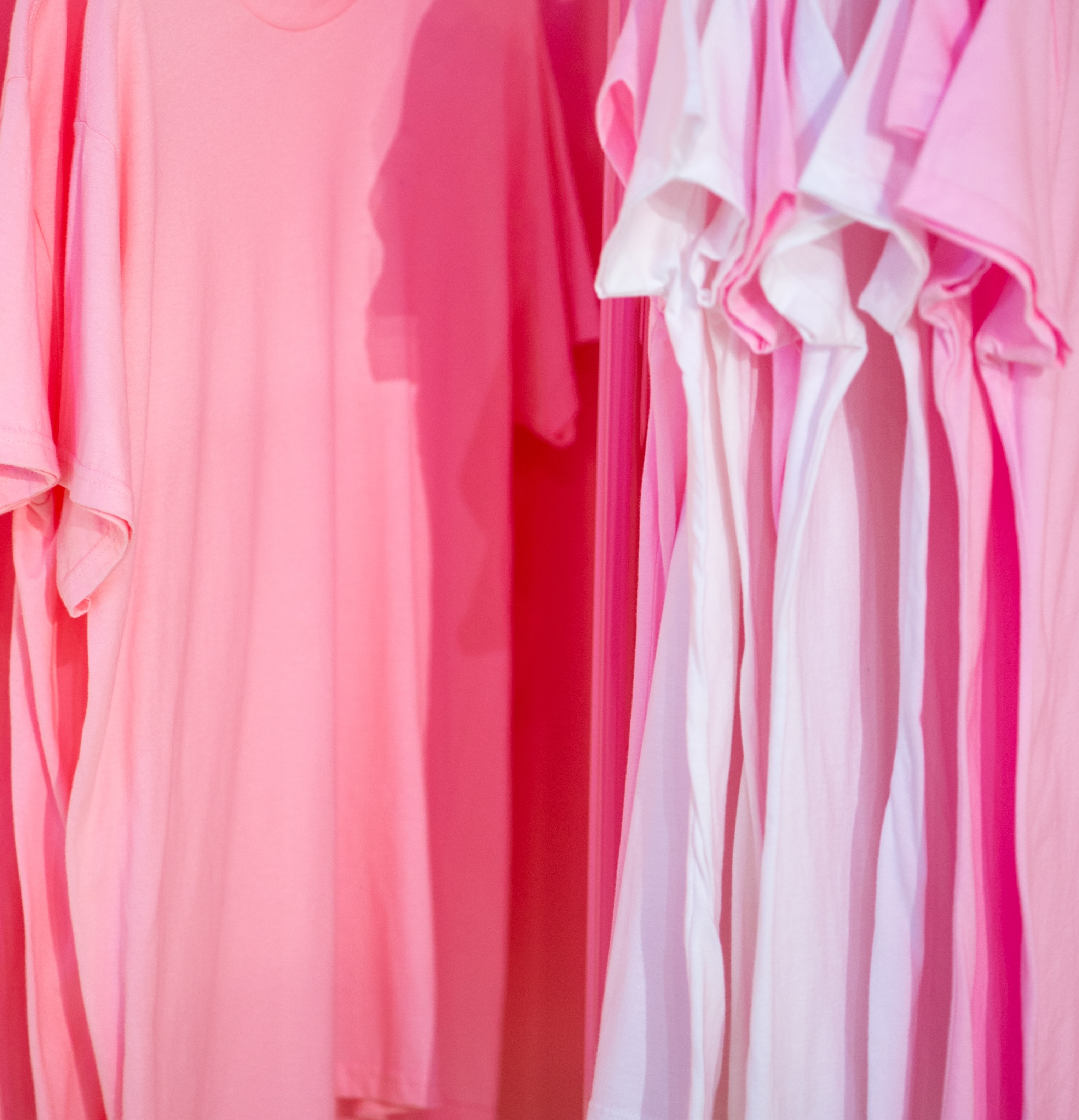 pink t-shirts hanging